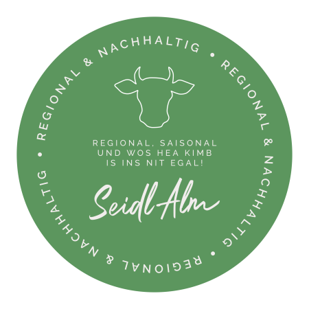 Ein rundes Logo zur Nachhaltigkeit auf der Seidlalm, in grün.